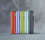 Five IQOS ILUMA i ONE devices in various colors