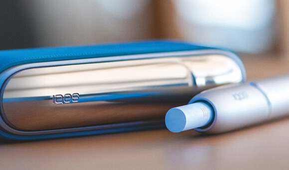 Man Holding IQOS 3 White