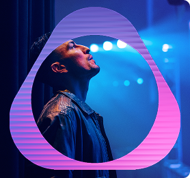 A man behind an IQOS logo