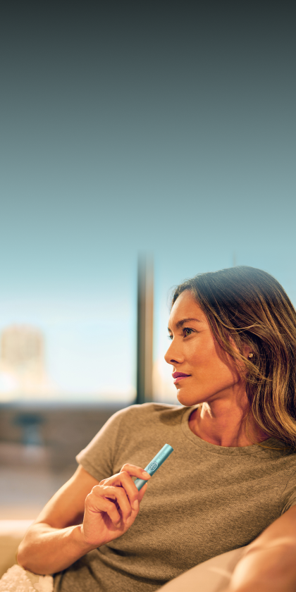 A woman enjoying her iqos
