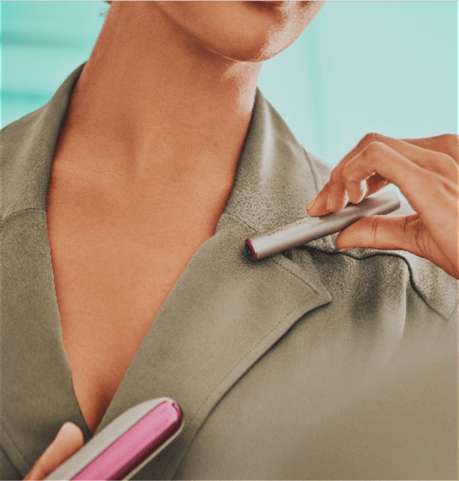 A woman getting ready to use her IQOS.