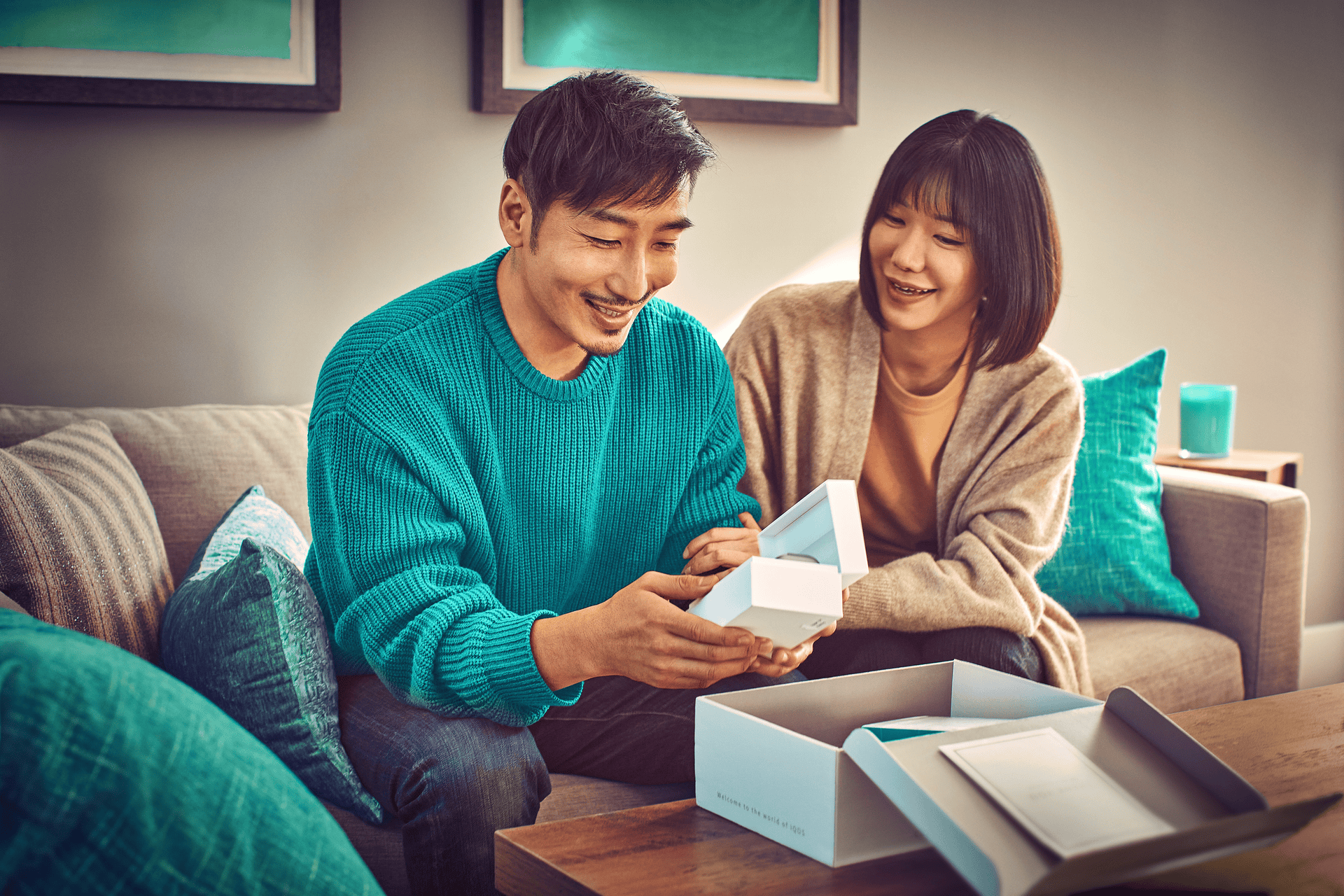 A couple unboxing their device