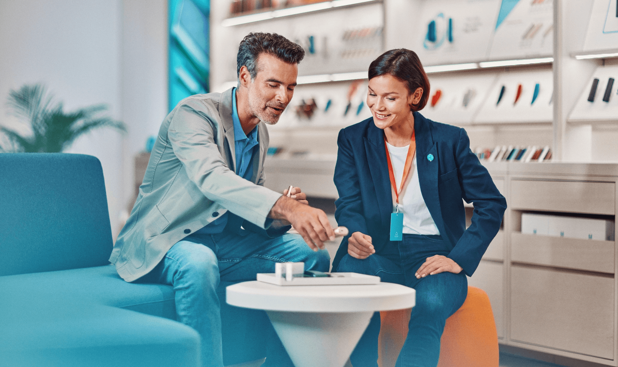 A woman opening a package from IQOS.