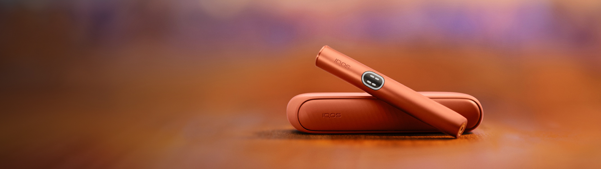 A woman showing off her IQOS