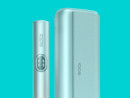 A woman comparing her device