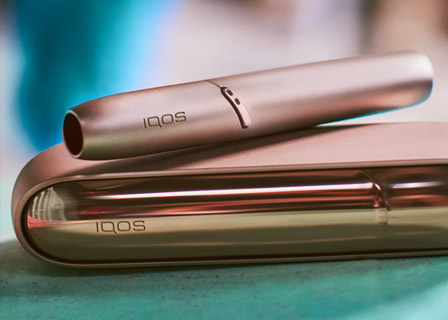 Stellar blue IQOS 3 DUO holder with HEETS stick and charger
