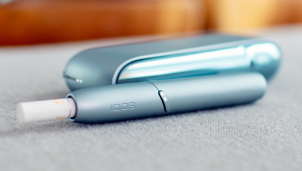 IQOS 3 next to coffee cups